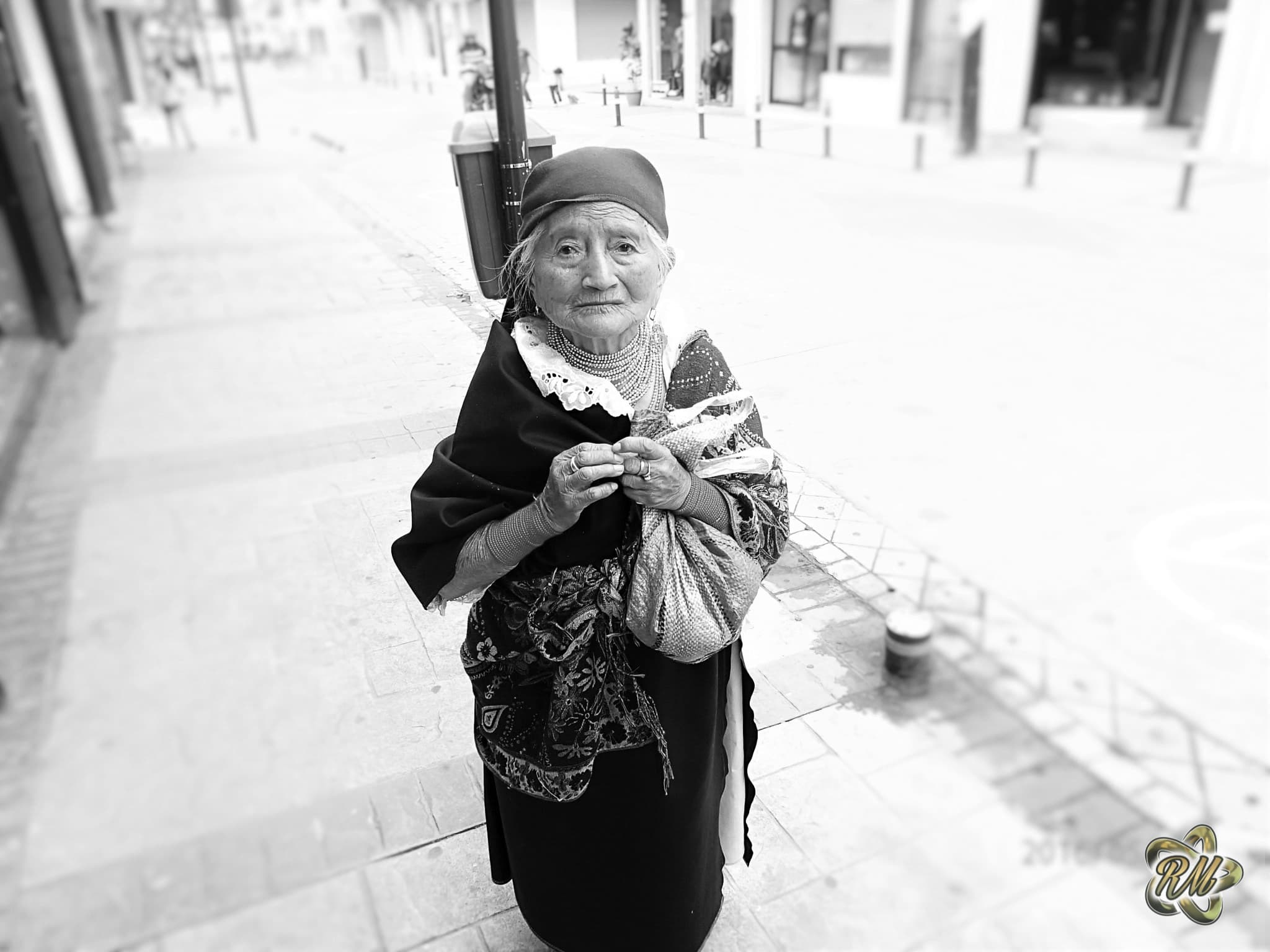 Black-and-white candid of a child with an outstretched hand