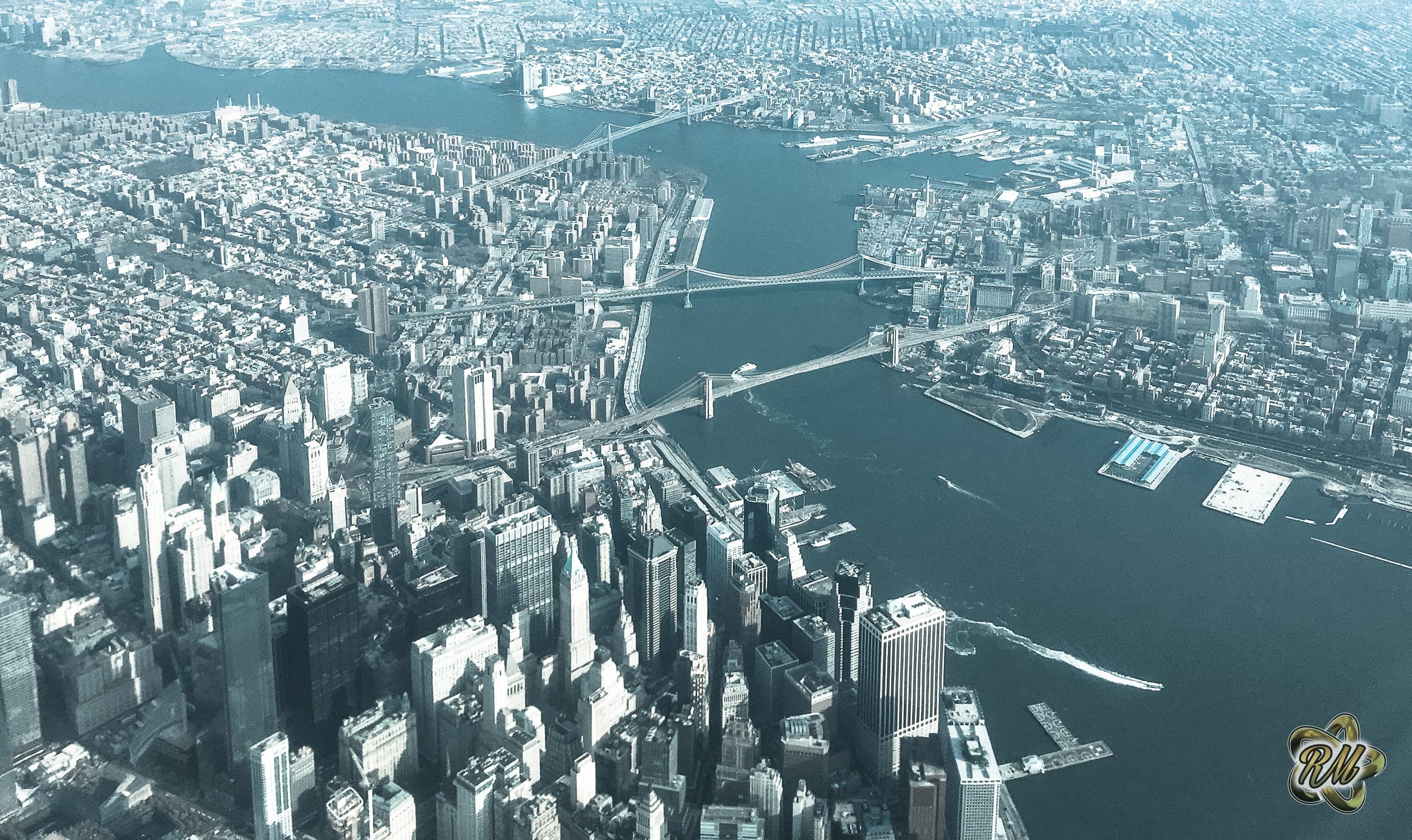 Aerial view of Lower Manhattan, the East River, and the Brooklyn Bridge